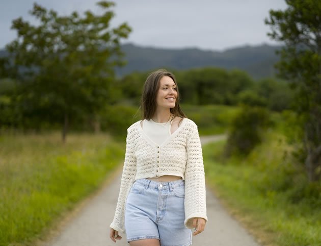 front-view-happy-woman-posing-outside